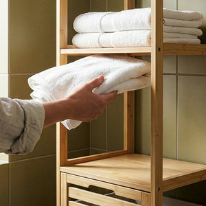 Regał łazienkowy z koszem na pranie Anun 130x36x33 cm bambus kolor drewna [en.casa]